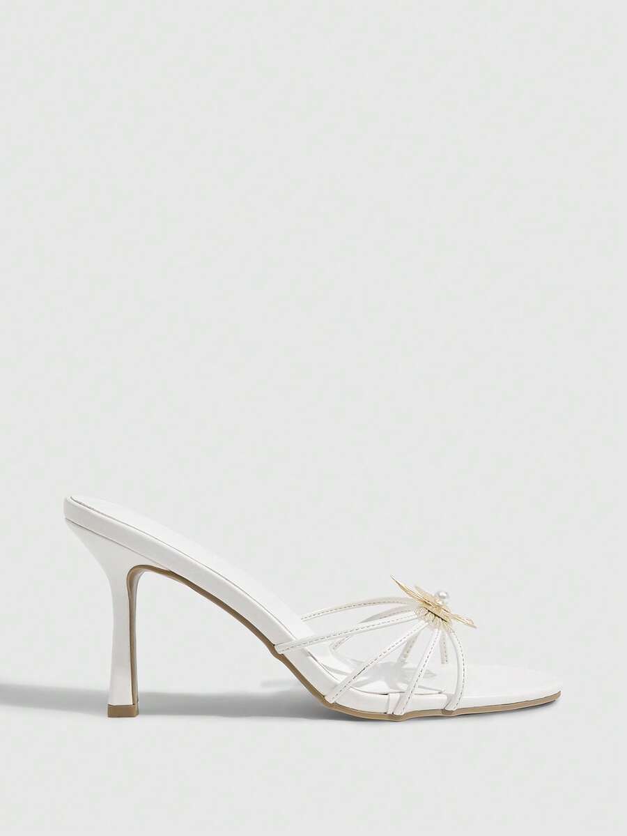 Butterfly high heel sandals featuring crystal embellished ankle straps, open toe design, and sleek stiletto heels for wedding and party wear.