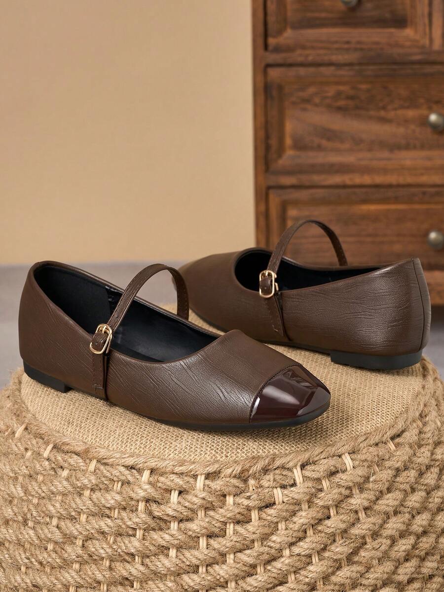 Pair of women's square toe slip-on flat shoes featuring a delicate bow detail and low vamp design.