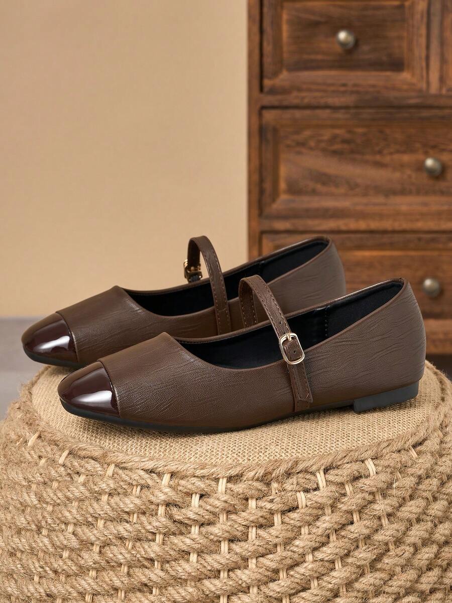 Pair of women's square toe slip-on flat shoes featuring a delicate bow detail and low vamp design.