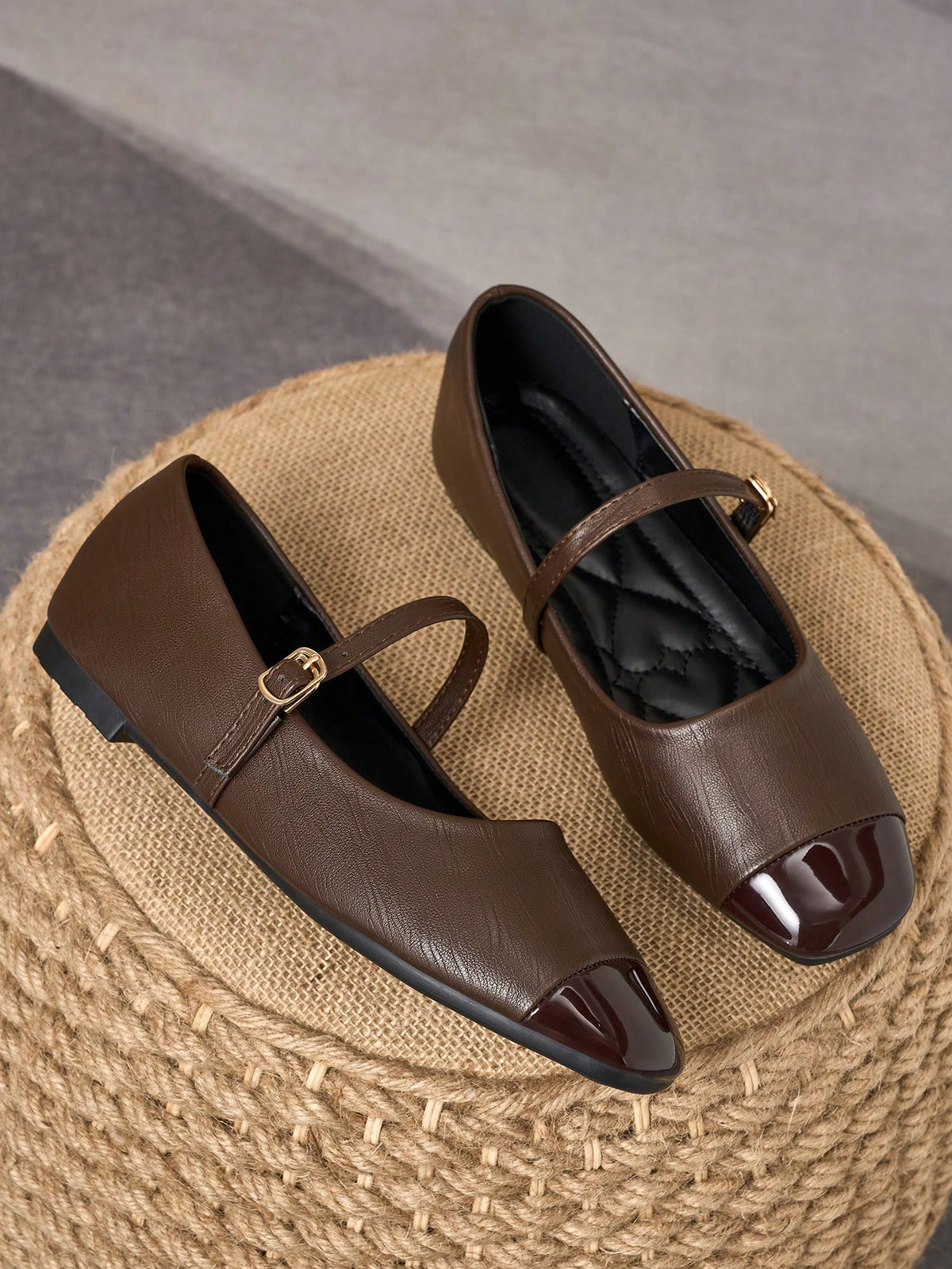 Pair of women's square toe slip-on flat shoes featuring a delicate bow detail and low vamp design.