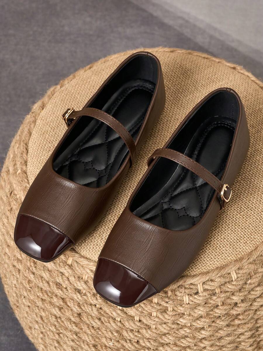 Pair of women's square toe slip-on flat shoes featuring a delicate bow detail and low vamp design.