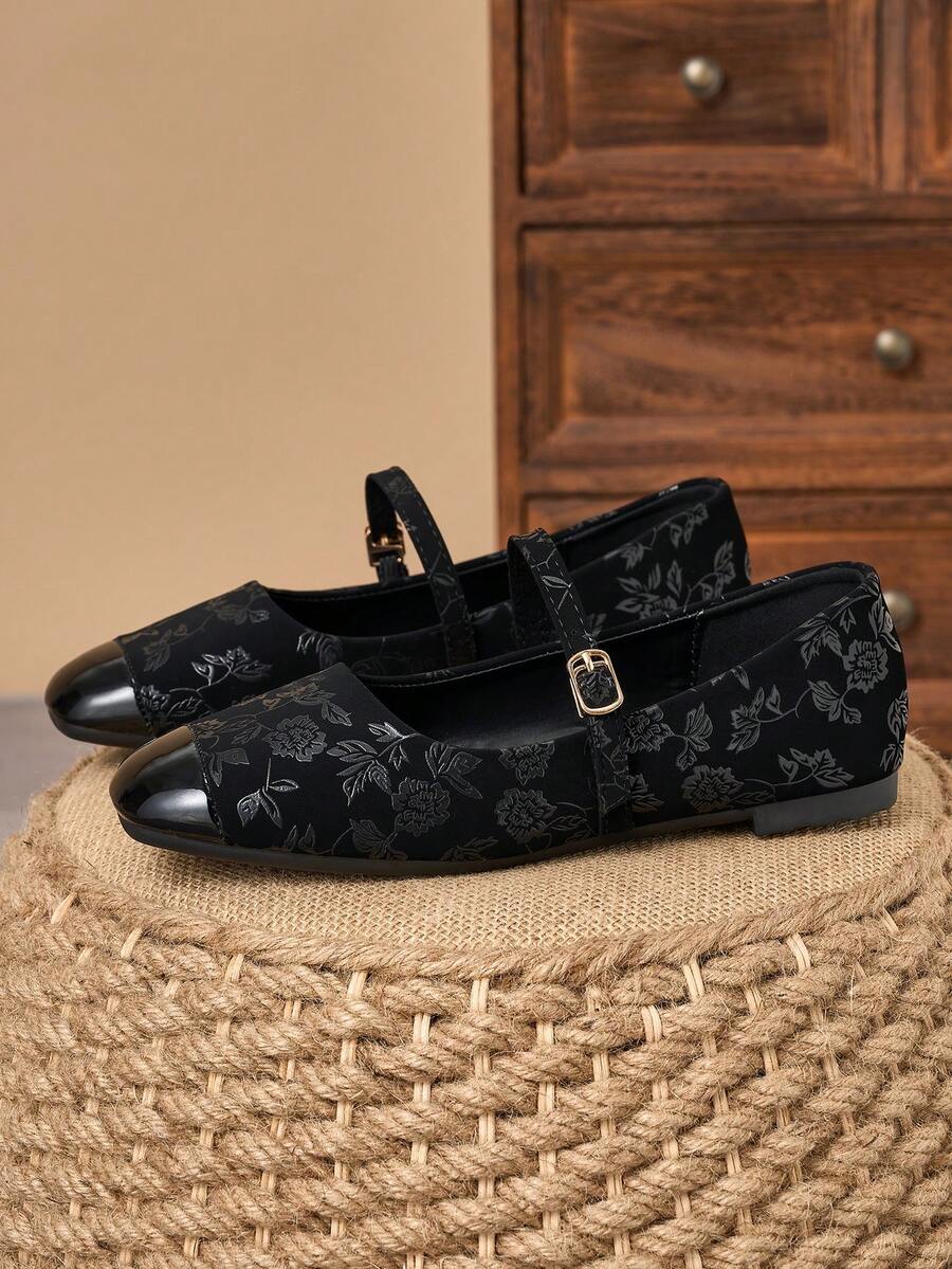 Pair of women's square toe slip-on flat shoes featuring a delicate bow detail and low vamp design.