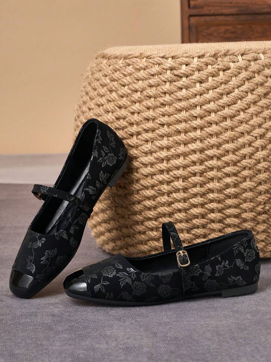 Pair of women's square toe slip-on flat shoes featuring a delicate bow detail and low vamp design.