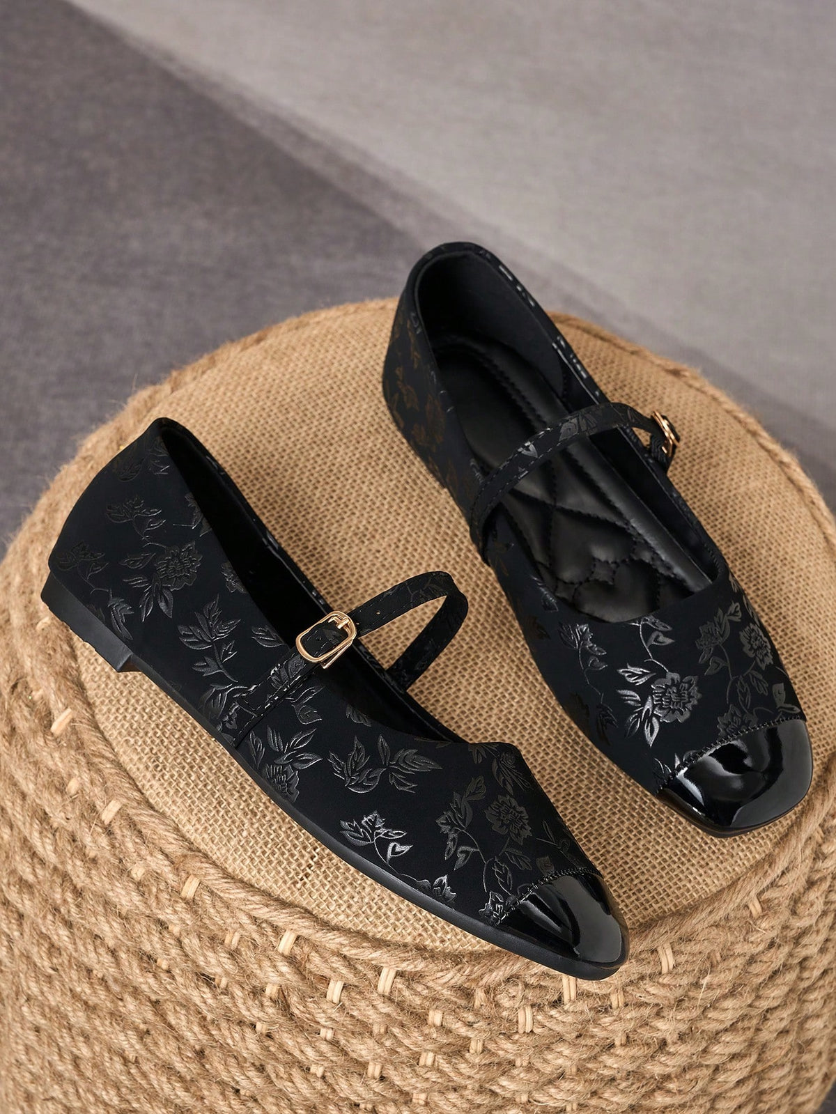 Pair of women's square toe slip-on flat shoes featuring a delicate bow detail and low vamp design.
