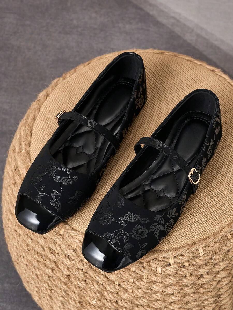 Pair of women's square toe slip-on flat shoes featuring a delicate bow detail and low vamp design.