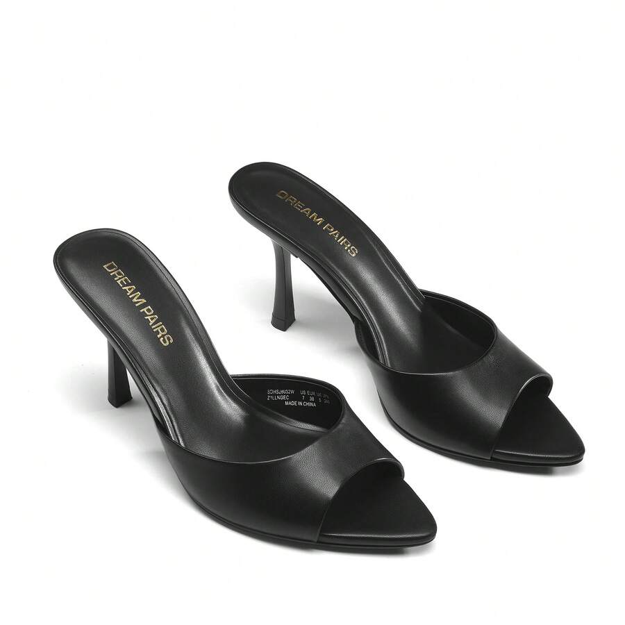 Women's pointed peep toe high heel sandals featuring a sleek stiletto heel, slip-on mule design, and smooth faux leather finish.