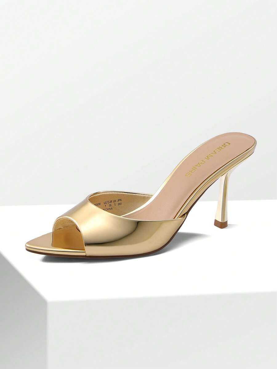 Women's pointed peep toe high heel sandals featuring a sleek stiletto heel, slip-on mule design, and smooth faux leather finish.