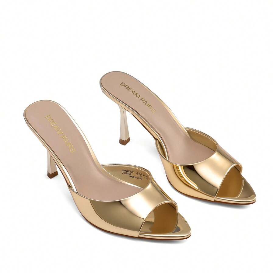 Women's pointed peep toe high heel sandals featuring a sleek stiletto heel, slip-on mule design, and smooth faux leather finish.