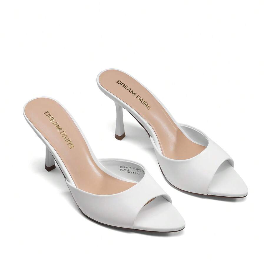Women's pointed peep toe high heel sandals featuring a sleek stiletto heel, slip-on mule design, and smooth faux leather finish.