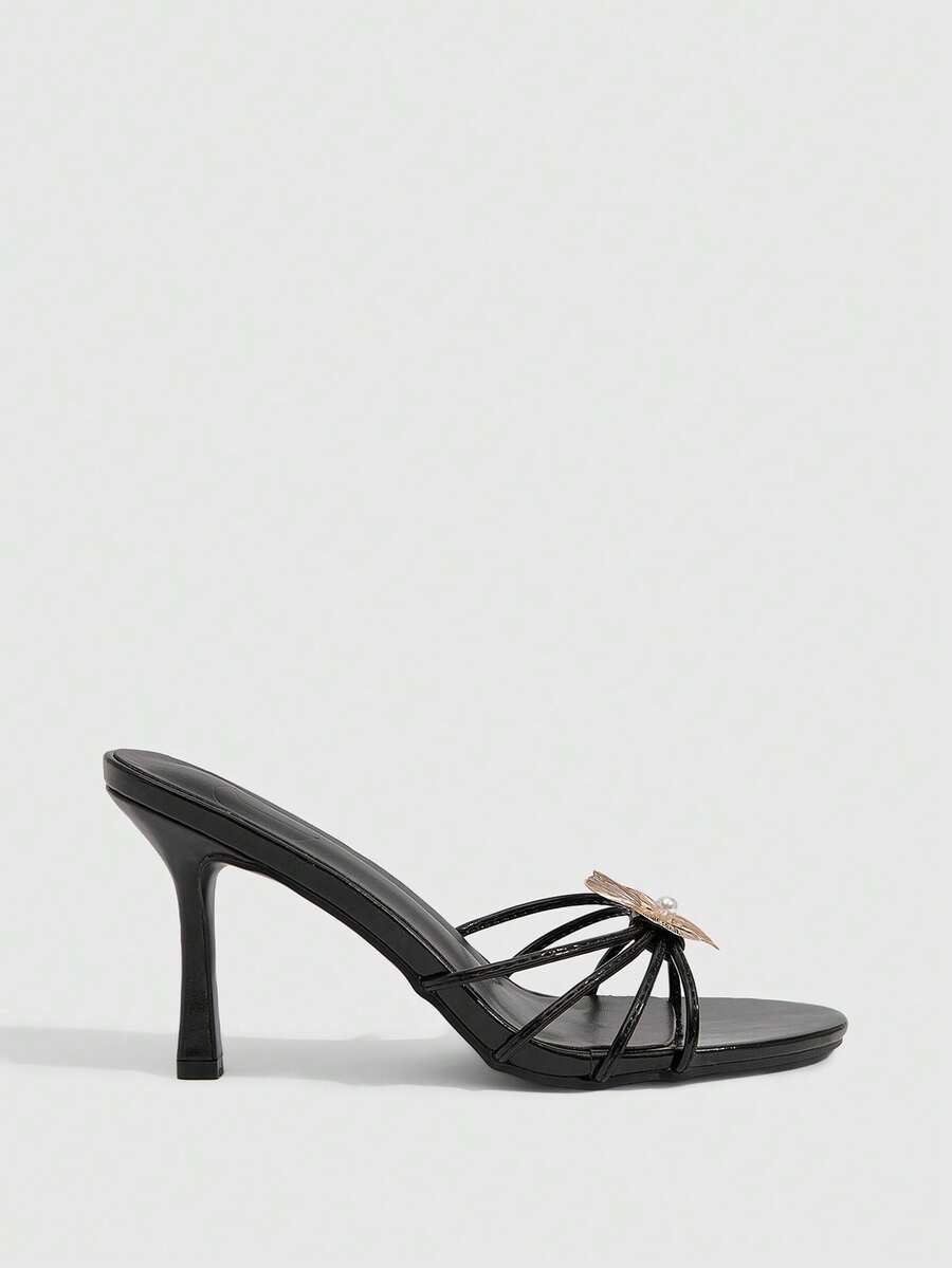 Butterfly high heel sandals featuring crystal embellished ankle straps, open toe design, and sleek stiletto heels for wedding and party wear.