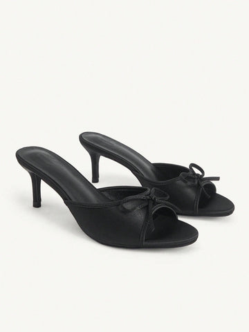 Women's black open-toe stiletto mule high heel sandals with bow detail