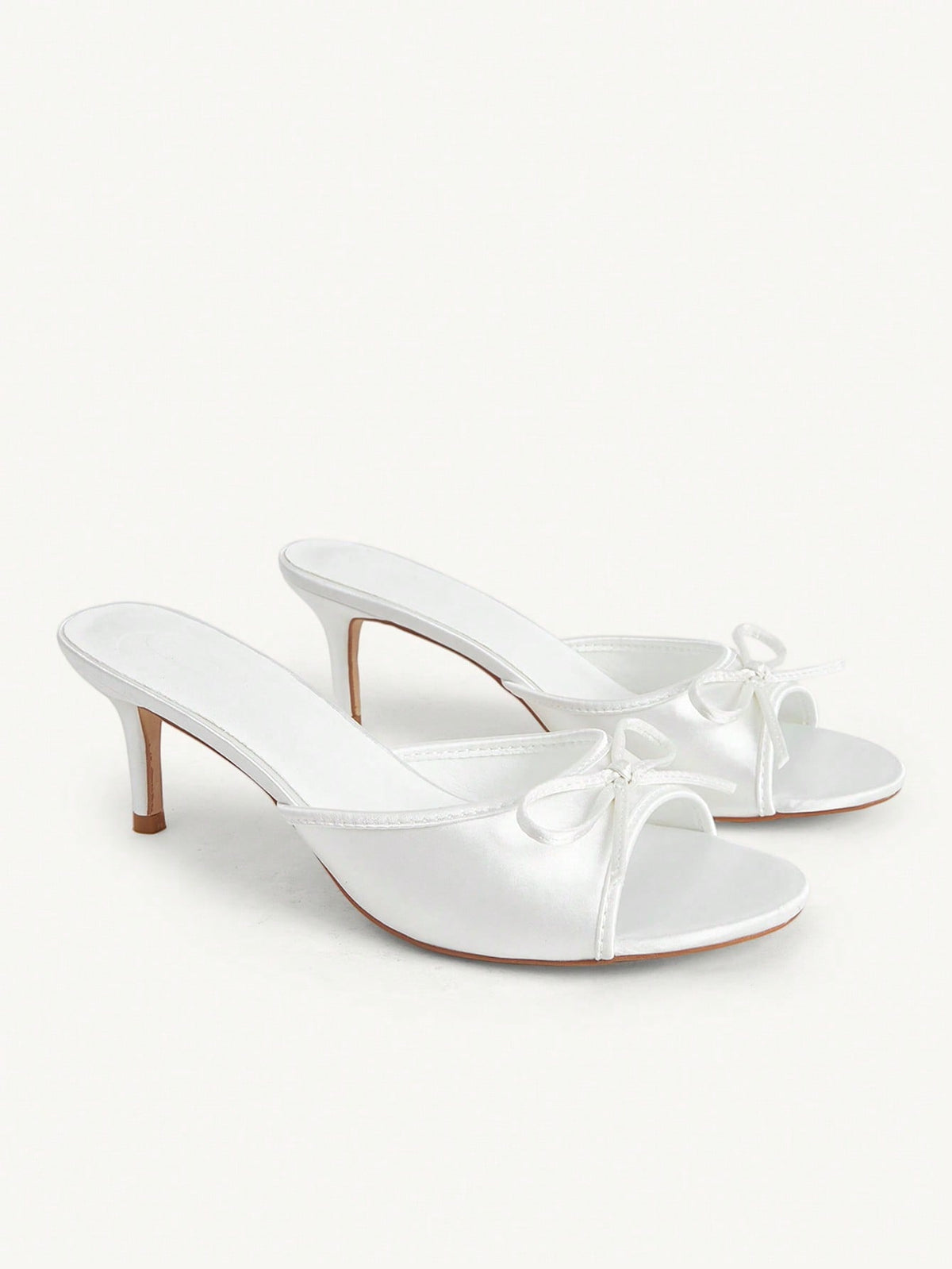 Women's black open-toe stiletto mule high heel sandals with bow detail
