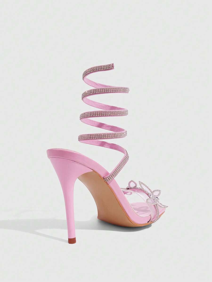 Women's square toe high heel slingback sandals featuring sparkling rhinestone floral accents, an open toe design, and sleek stiletto heels for summer parties.