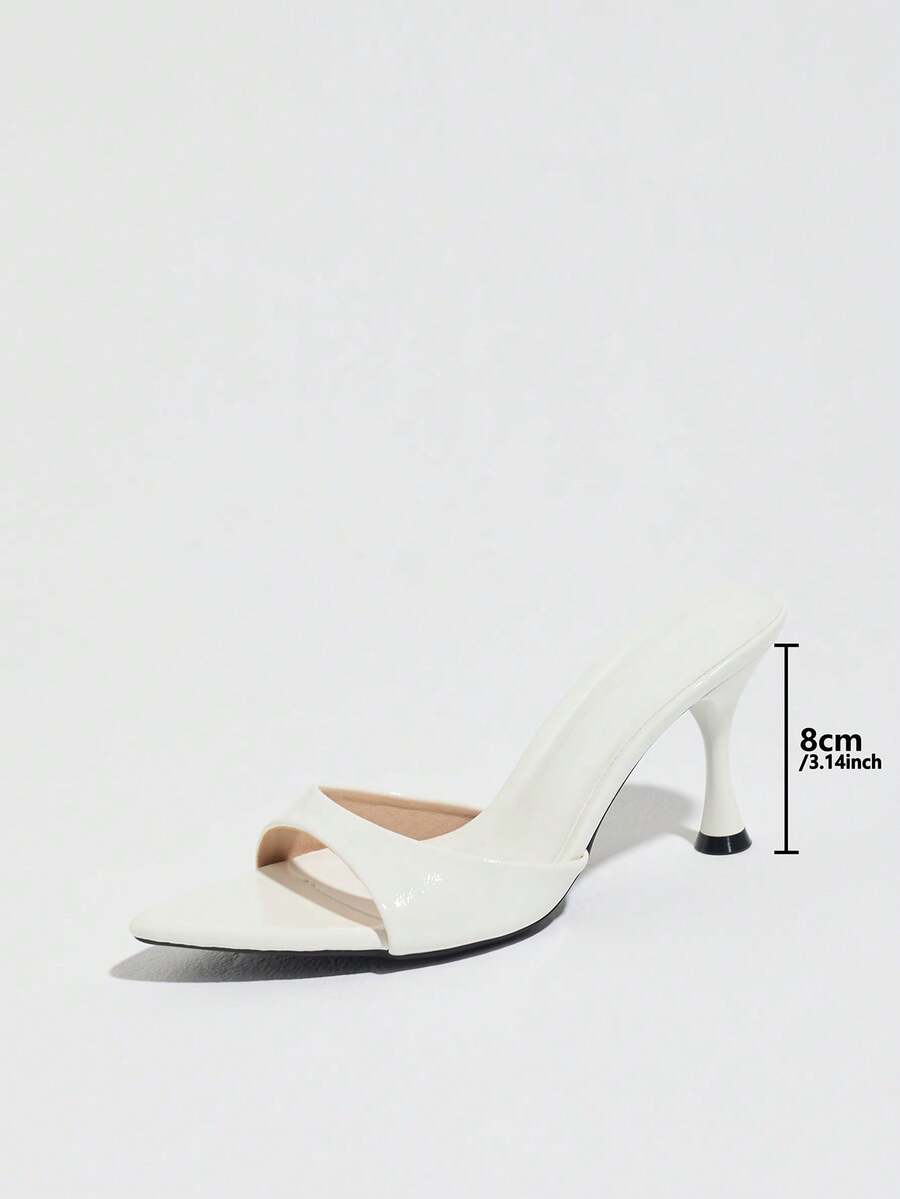 Women's open pointed toe stiletto mule high heel sandals featuring a glossy slip-on design.