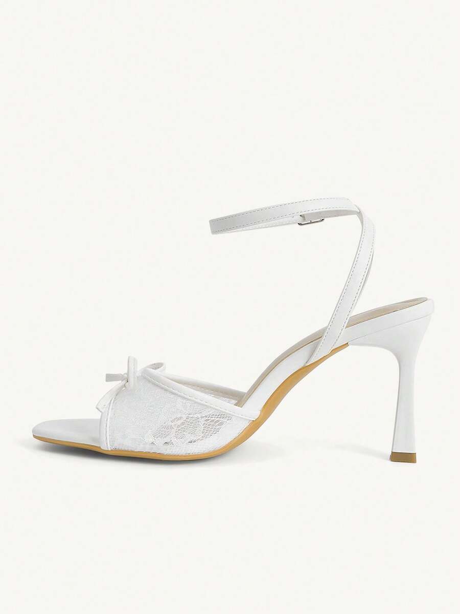 Women's open toe high heel sandals with lace mesh upper, stiletto heel, and ankle strap closure.