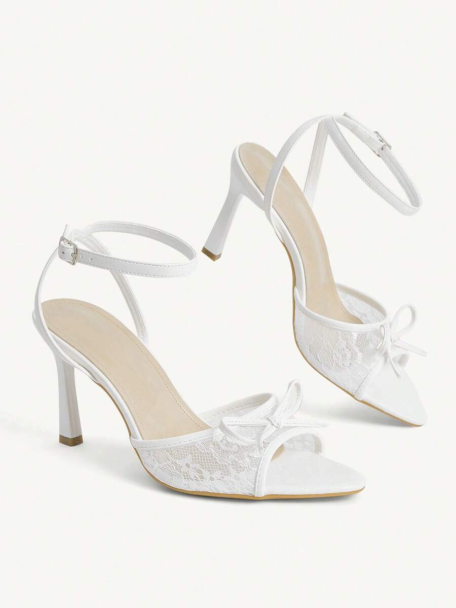 Women's open toe high heel sandals with lace mesh upper, stiletto heel, and ankle strap closure.