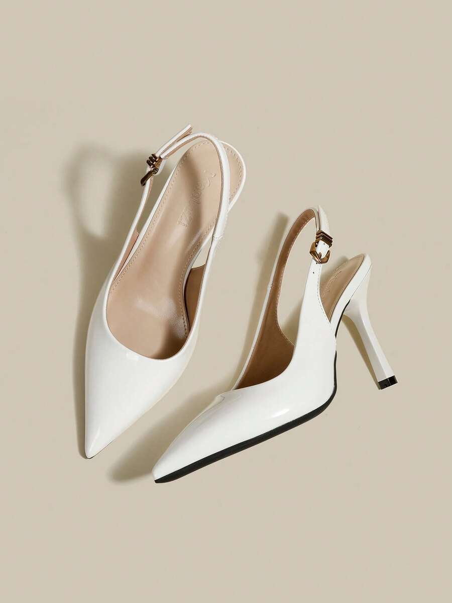 Women's pointed toe kitten heel pumps with adjustable buckle back strap and sleek patent finish.