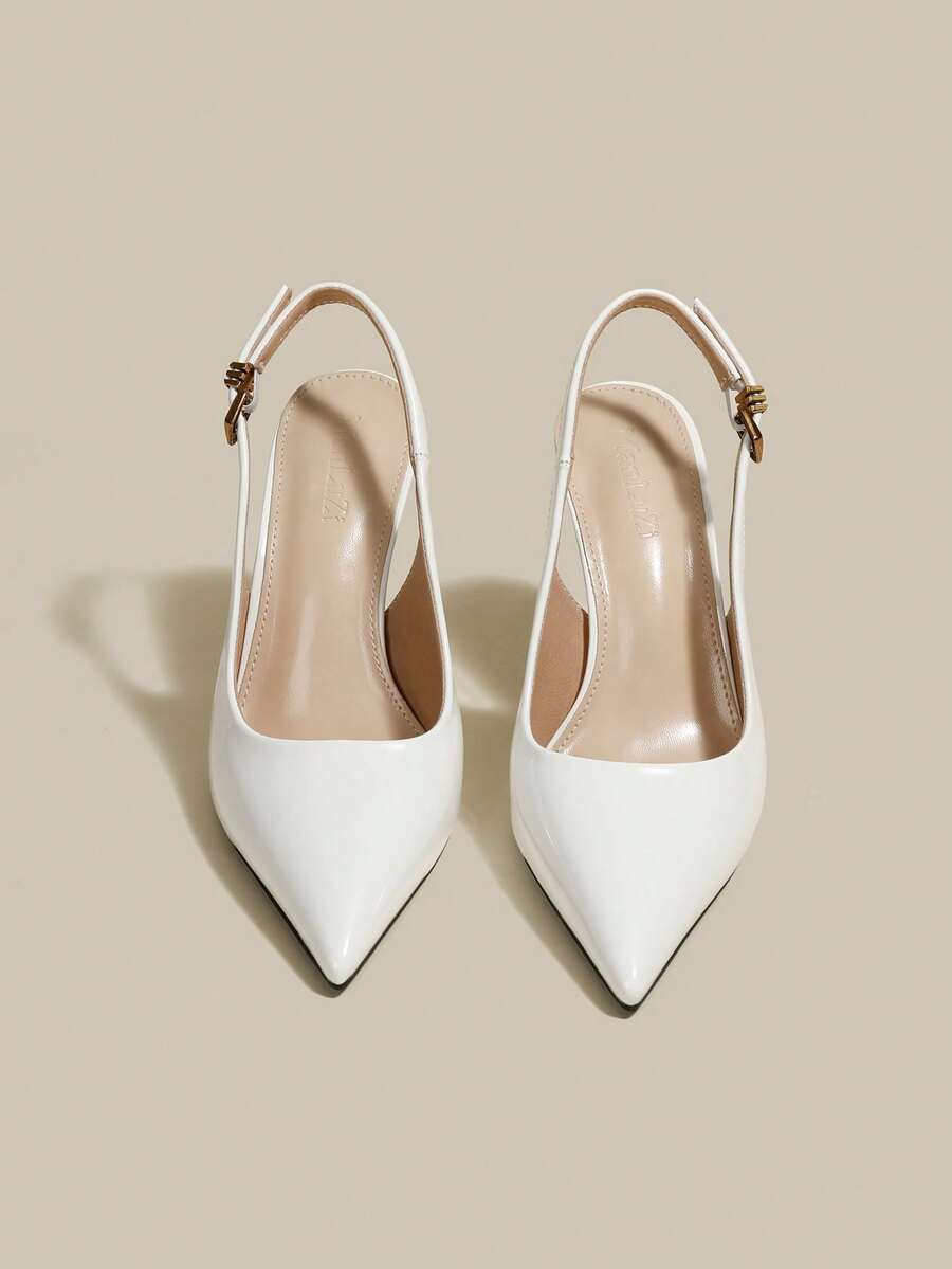 Women's pointed toe kitten heel pumps with adjustable buckle back strap and sleek patent finish.