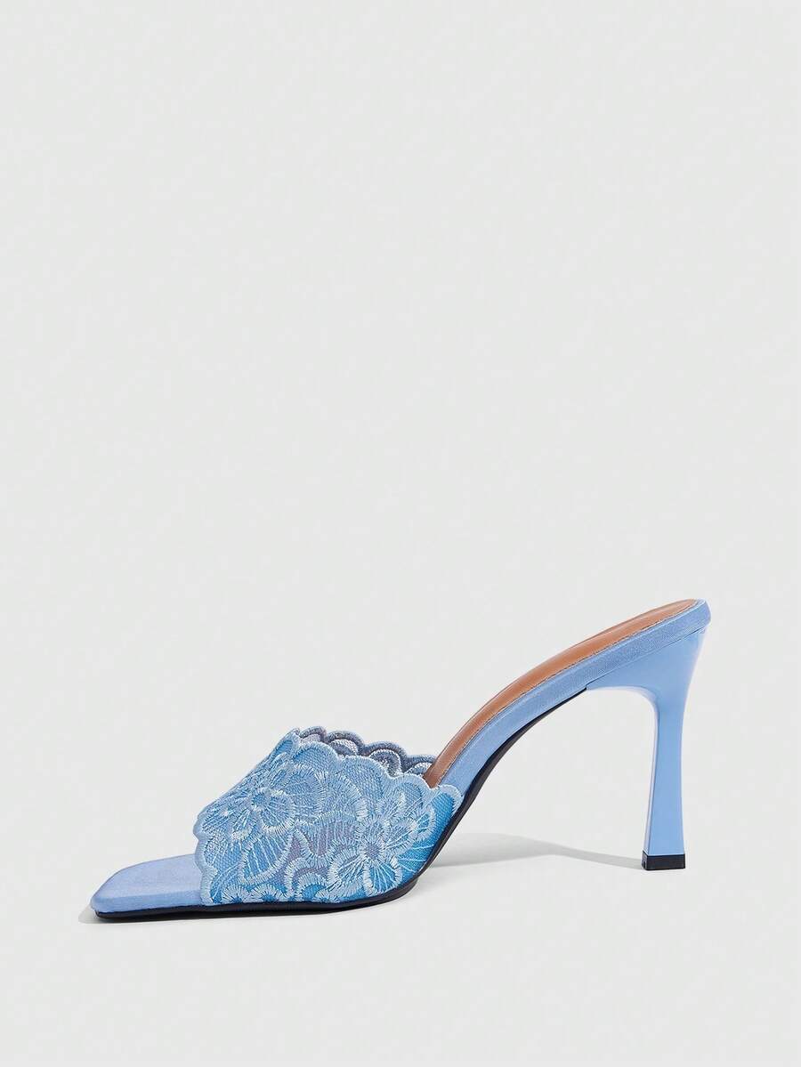 Women's square toe stiletto high heel slide sandals featuring contrast mesh embroidery and an open-toe backless design.