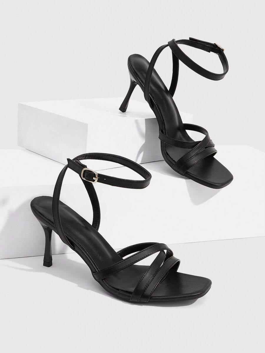 Square toe stiletto high heel sandals with crisscross strappy design and adjustable ankle buckle strap in light blue.
