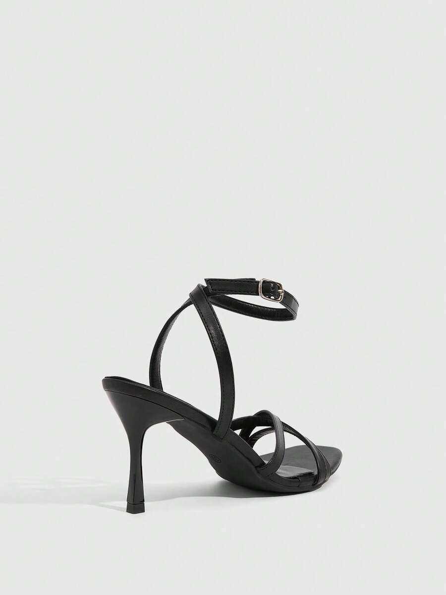 Square toe stiletto high heel sandals with crisscross strappy design and adjustable ankle buckle strap in light blue.