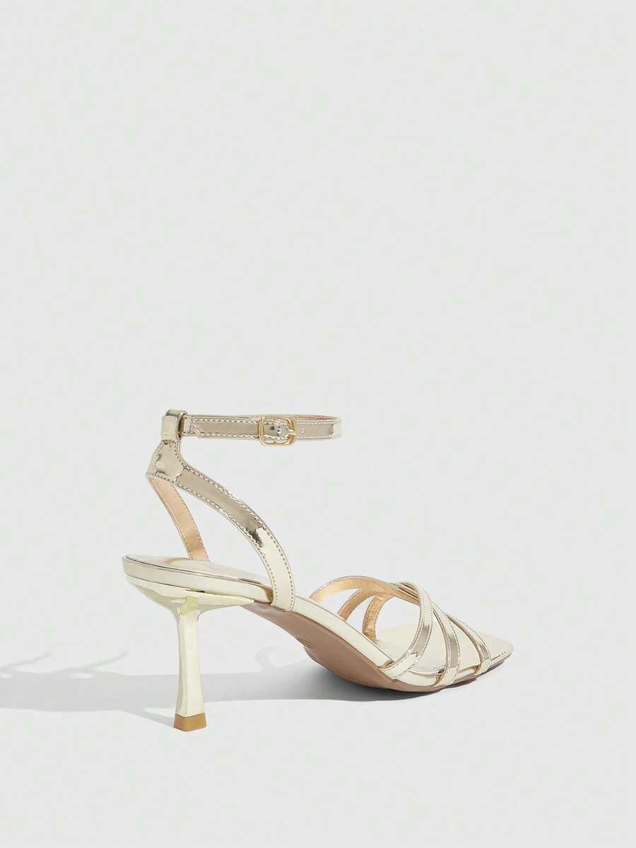 Women's open toe stiletto heel sandals featuring square toe design, criss-cross rhinestone slim straps, and secure ankle strap.