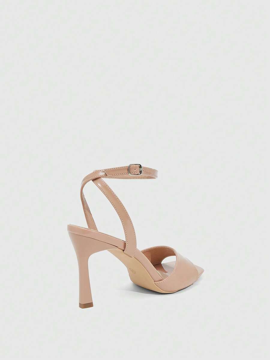 Women's peep toe ankle strap high heel sandals featuring a sleek stiletto heel and adjustable buckle closure.