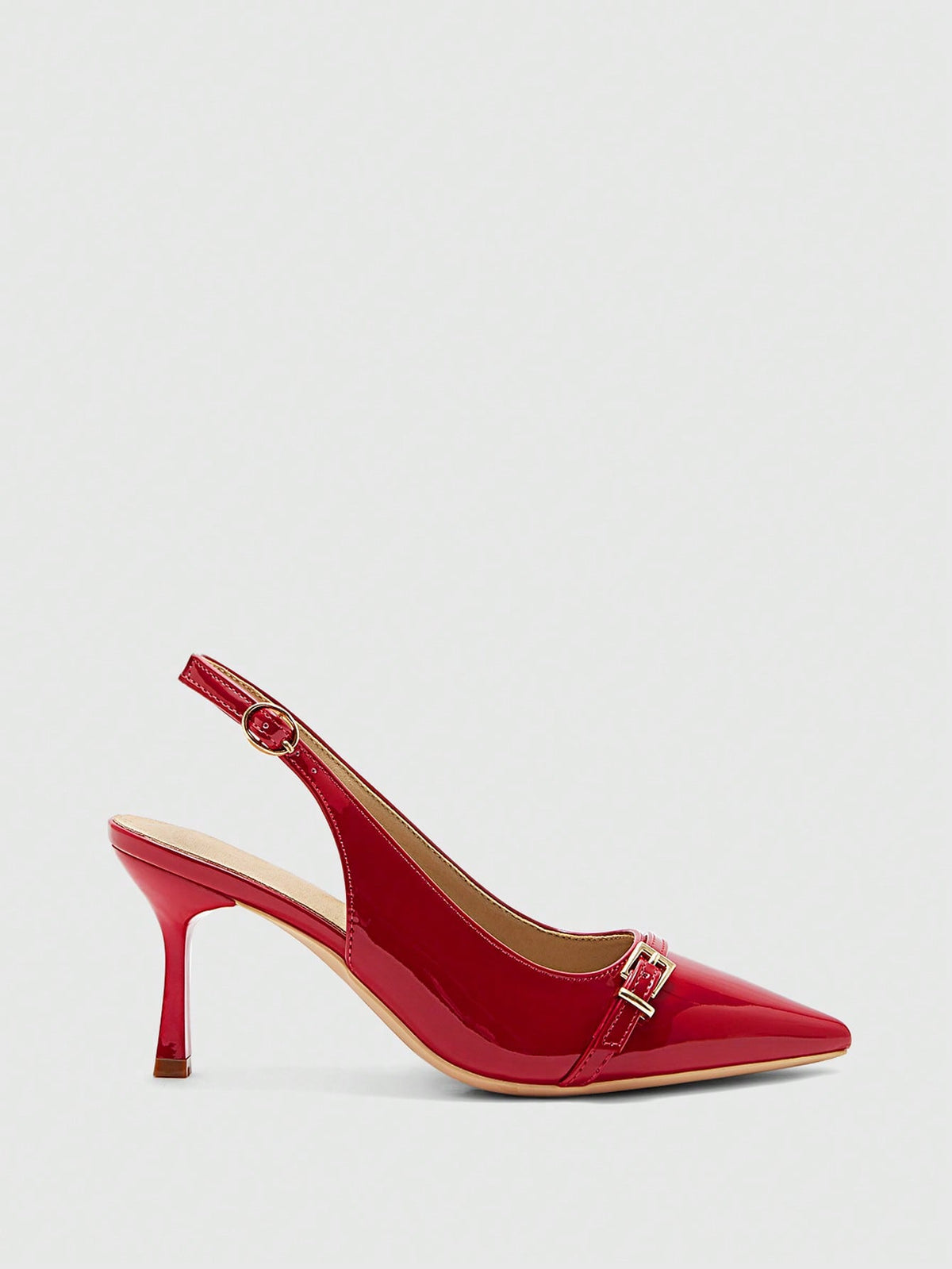 Beige pointed toe high heel pumps featuring a sleek stiletto heel and slingback strap for women.
