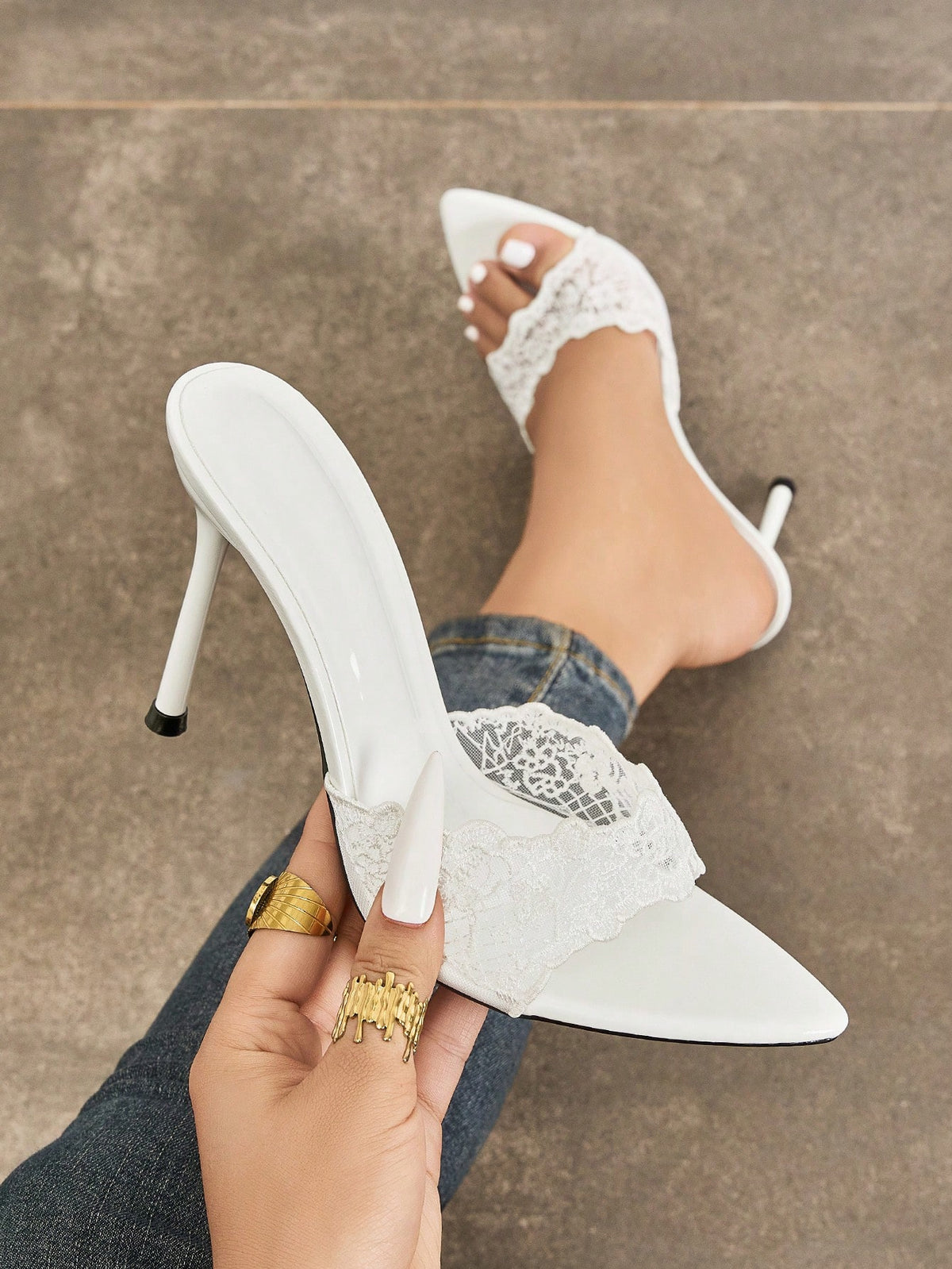 Women's elegant open toe high heel party mules featuring sleek stiletto heels and a slip-on design.