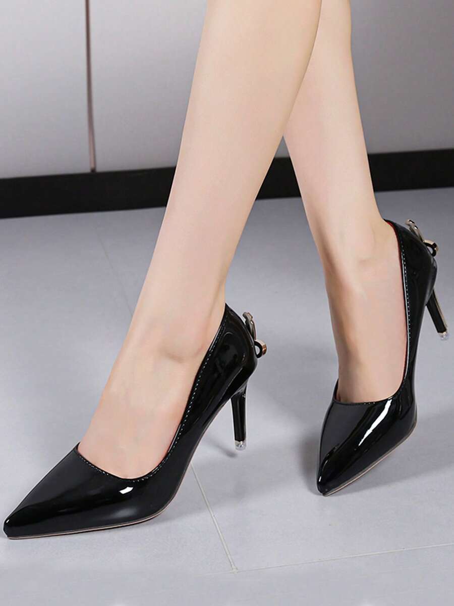 Glossy black pointed toe stiletto high heel pumps with bow detail for women