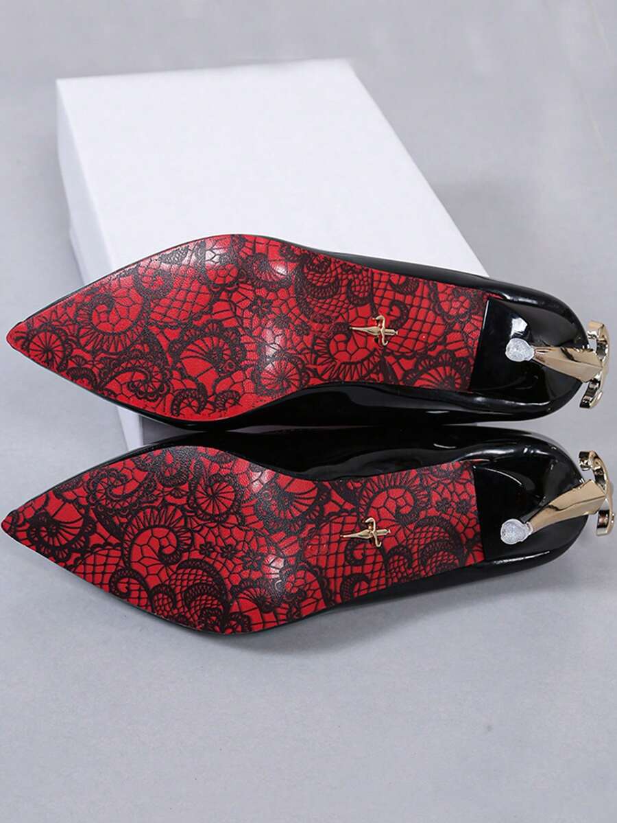 Glossy black pointed toe stiletto high heel pumps with bow detail for women