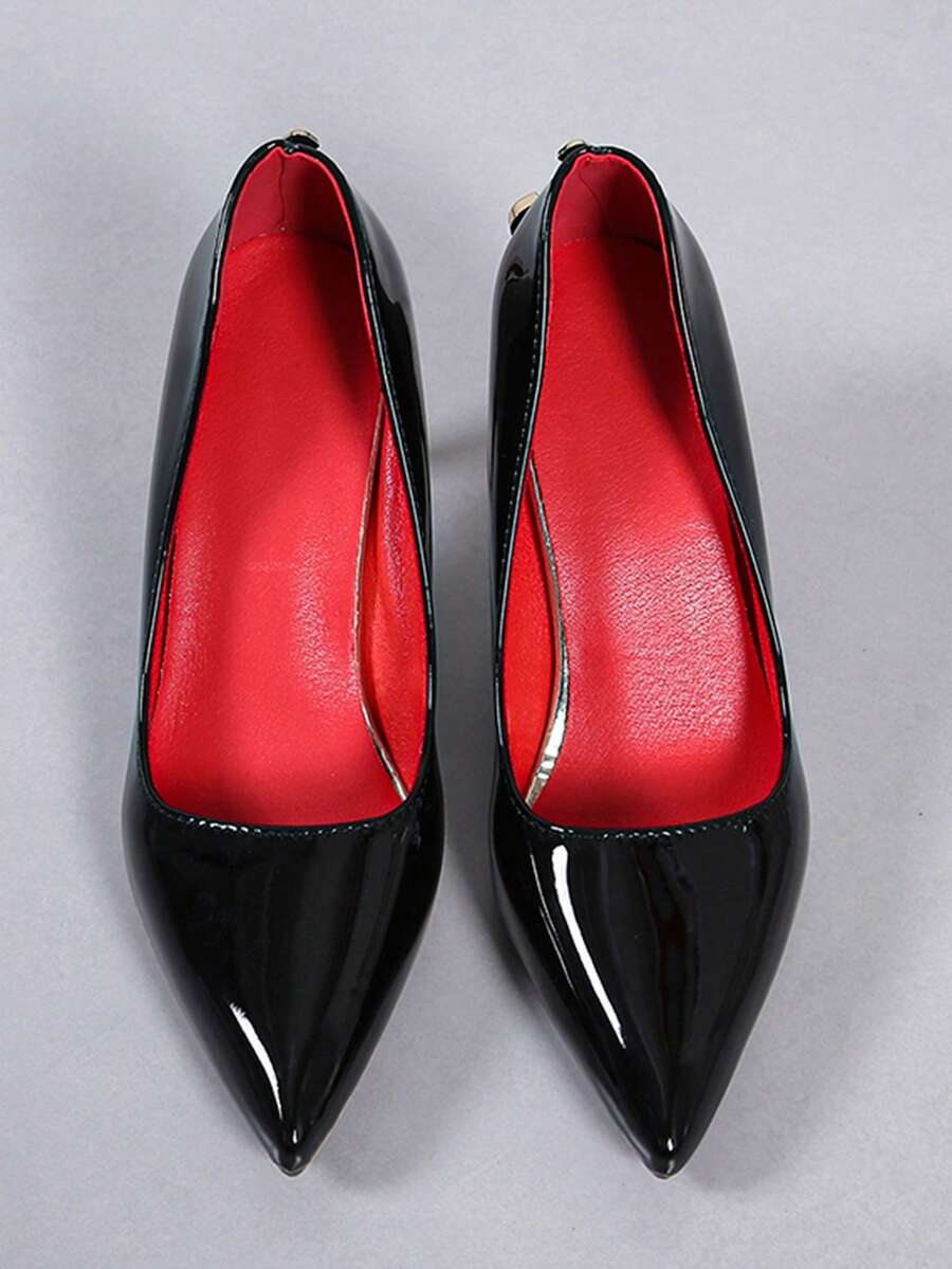 Glossy black pointed toe stiletto high heel pumps with bow detail for women