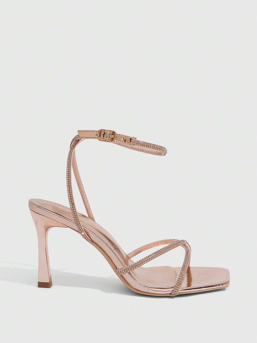 Women's open toe stiletto heel sandals featuring square toe design, criss-cross rhinestone slim straps, and secure ankle strap.