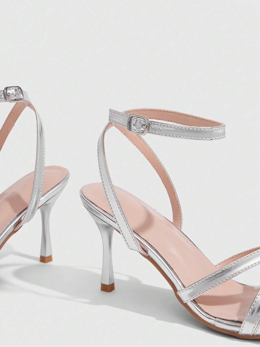 Square toe stiletto high heel sandals with crisscross strappy design and adjustable ankle buckle strap in light blue.