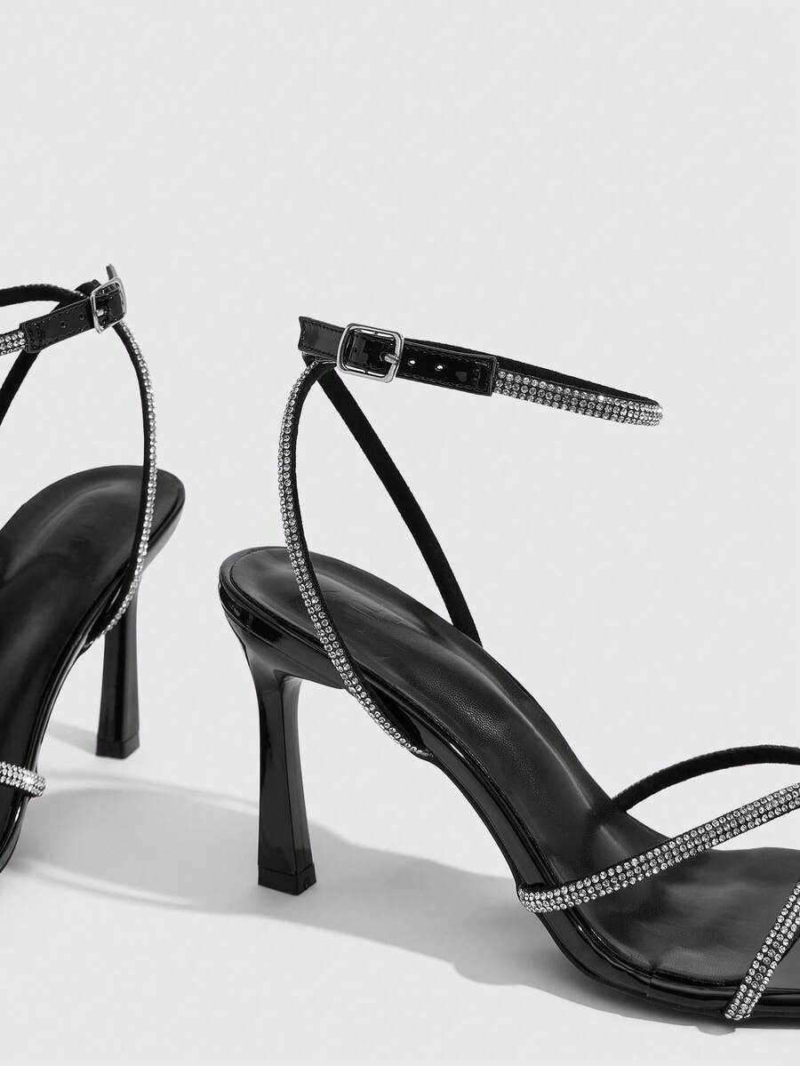 Women's open toe stiletto heel sandals featuring square toe design, criss-cross rhinestone slim straps, and secure ankle strap.
