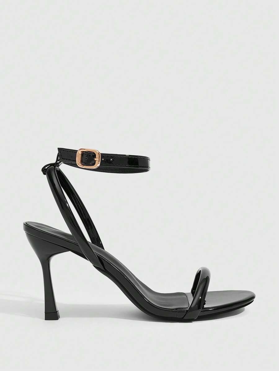 Women's open toe stiletto high heel sandals with an adjustable buckle strap and sleek PU leather finish