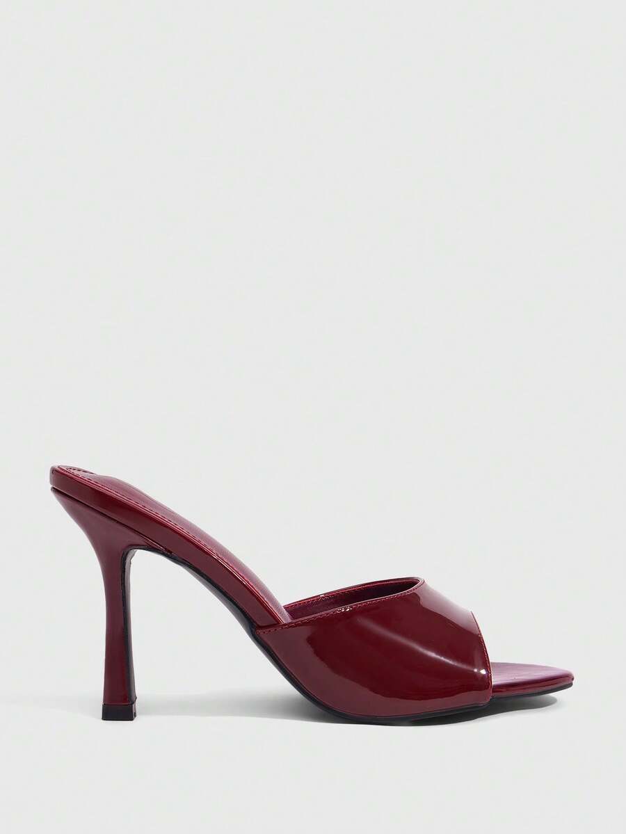 Women's open toe PU leather high heels mules sandals featuring sleek stiletto heels for party and wedding wear