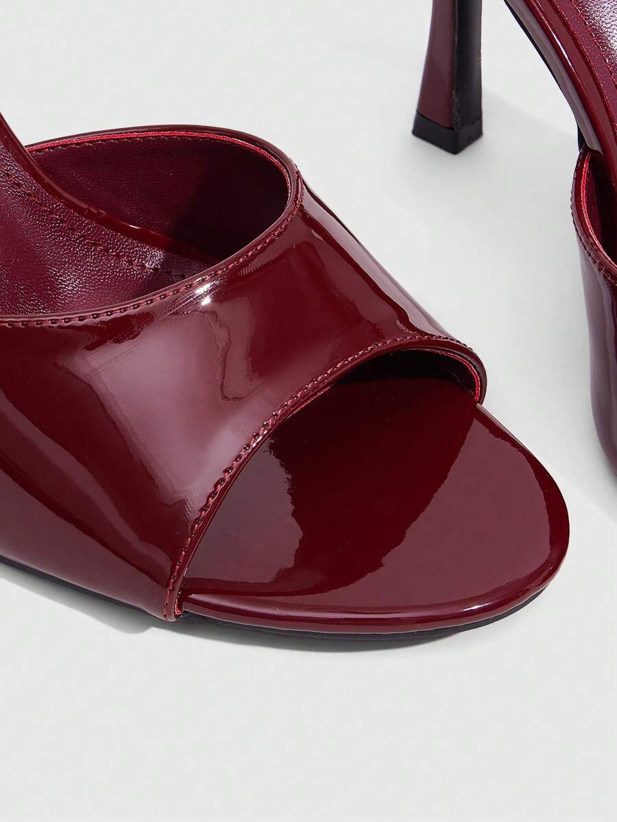 Women's open toe PU leather high heels mules sandals featuring sleek stiletto heels for party and wedding wear