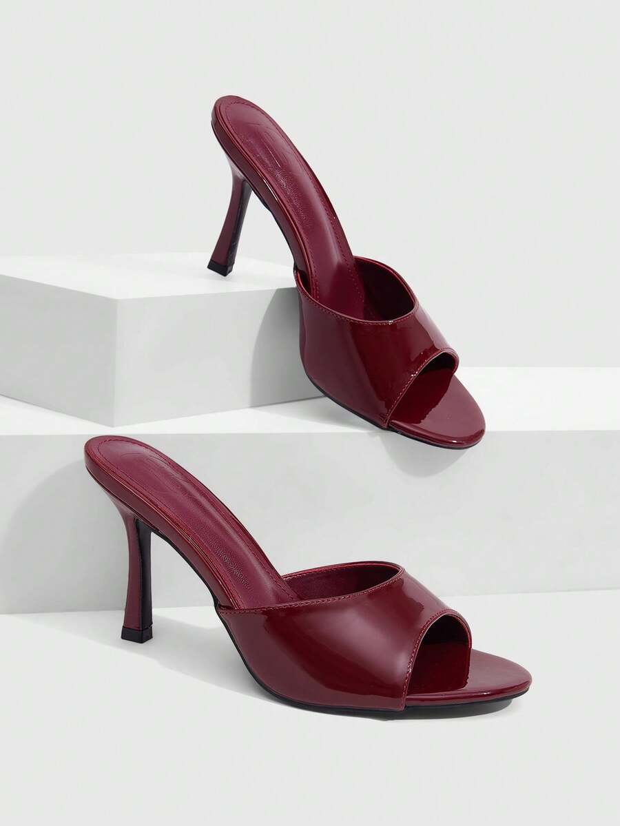 Women's open toe PU leather high heels mules sandals featuring sleek stiletto heels for party and wedding wear