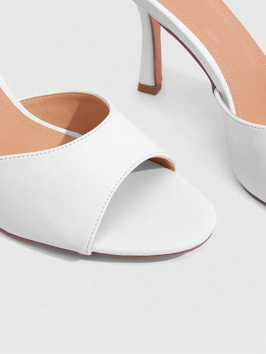 Women's open toe PU leather high heels mules sandals featuring sleek stiletto heels for party and wedding wear