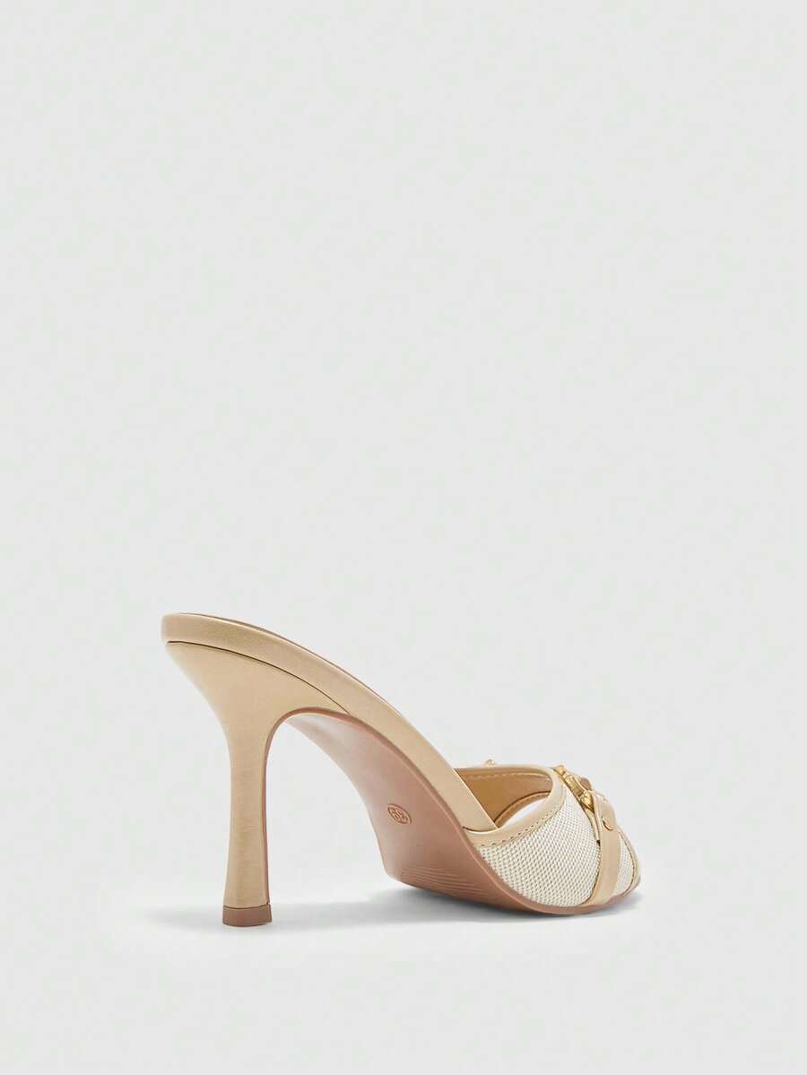 Women's open toe high heel slingback sandals featuring metal bamboo joint accent and stiletto heels.