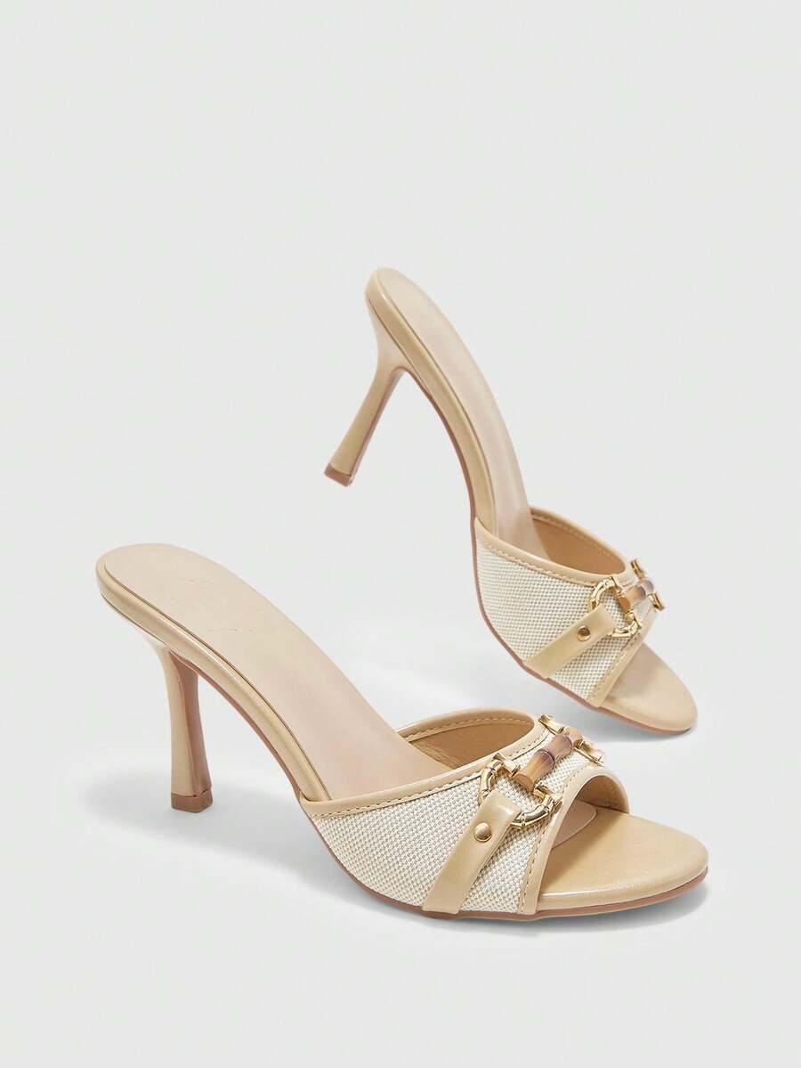 Women's open toe high heel slingback sandals featuring metal bamboo joint accent and stiletto heels.