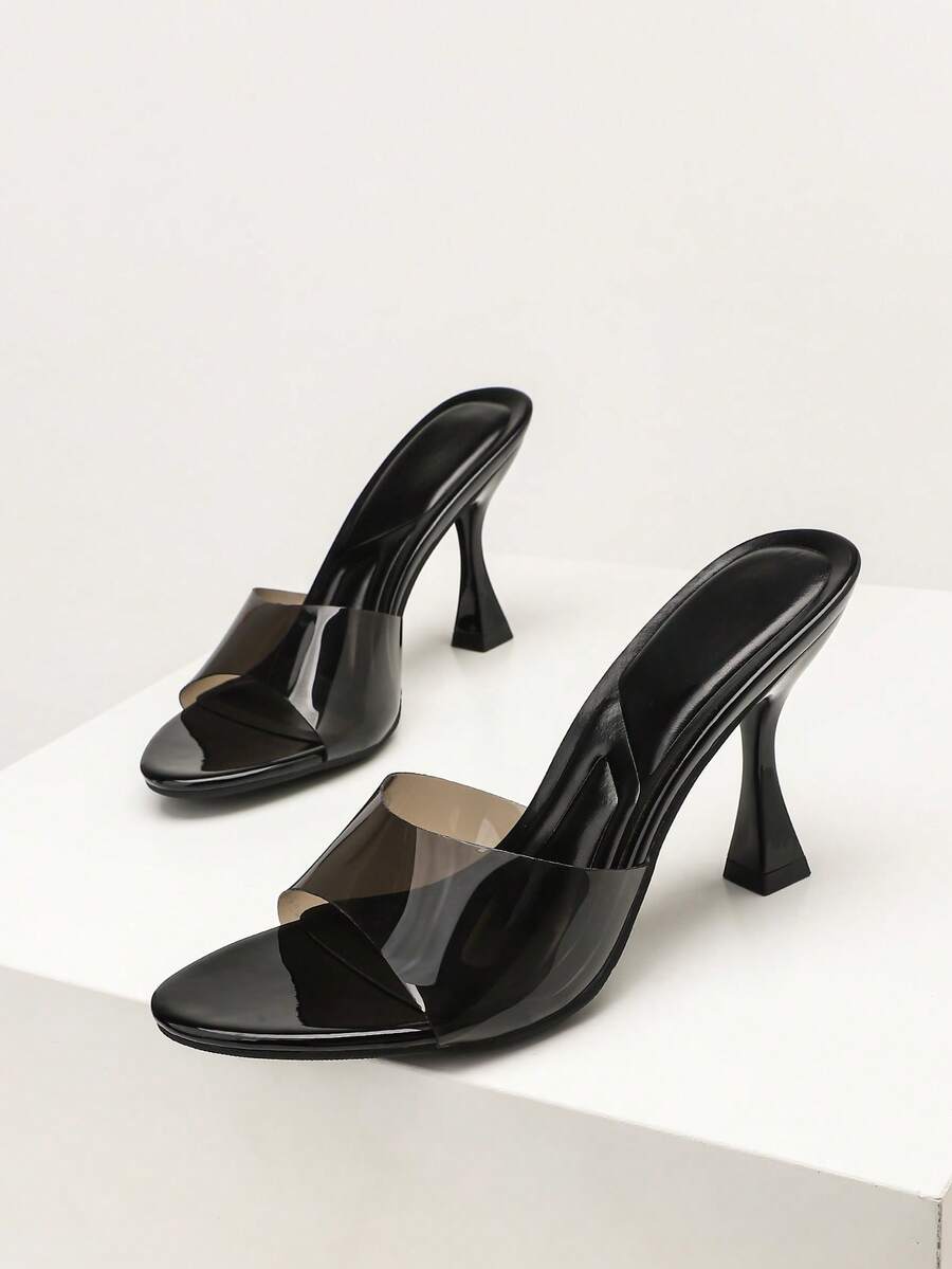 Women's stiletto high heel sandals with an open round toe and slingback strap crafted from smooth PU leather.