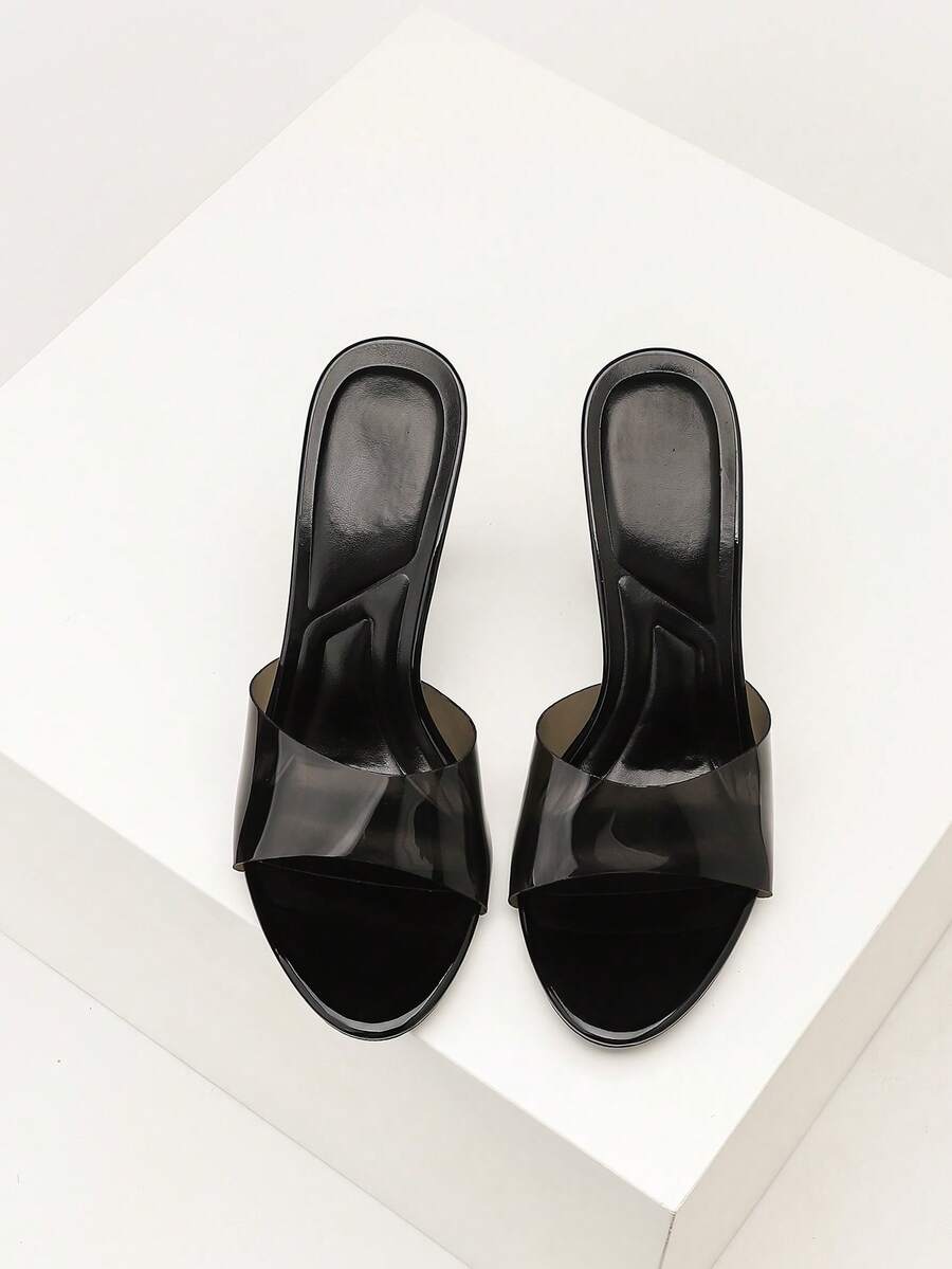 Women's stiletto high heel sandals with an open round toe and slingback strap crafted from smooth PU leather.