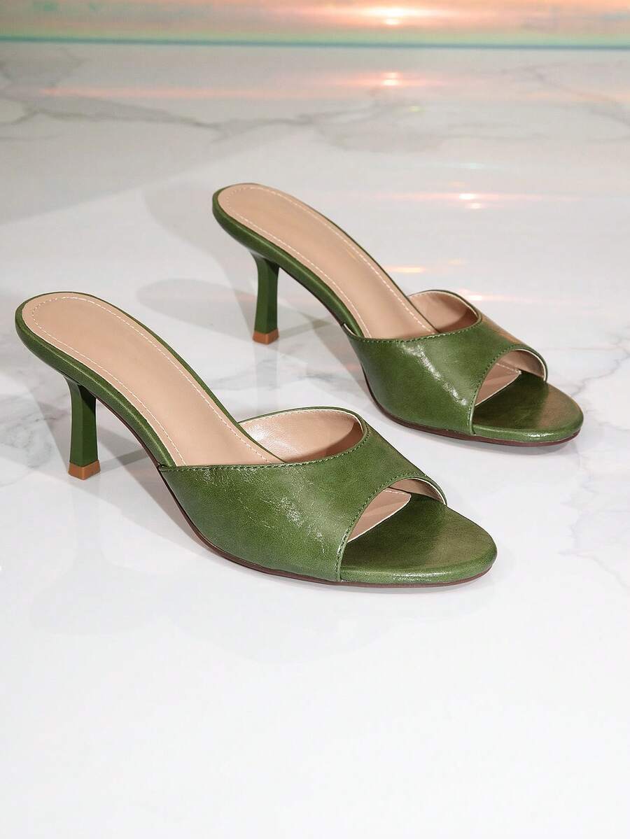 Elegant women's black stiletto heel sandals with open toe slingback design and PU leather upper.