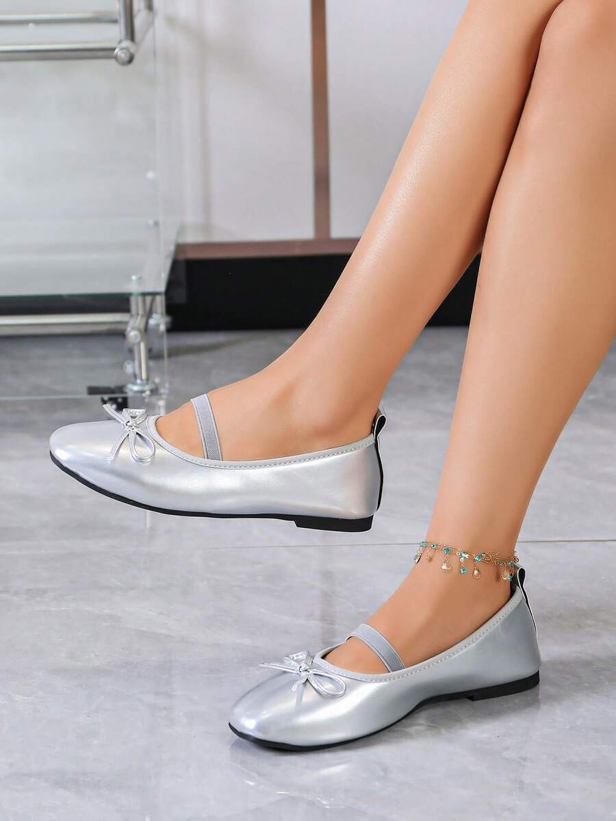 Square toe ballet flat shoes with bow detail and slip-on wide fit design.
