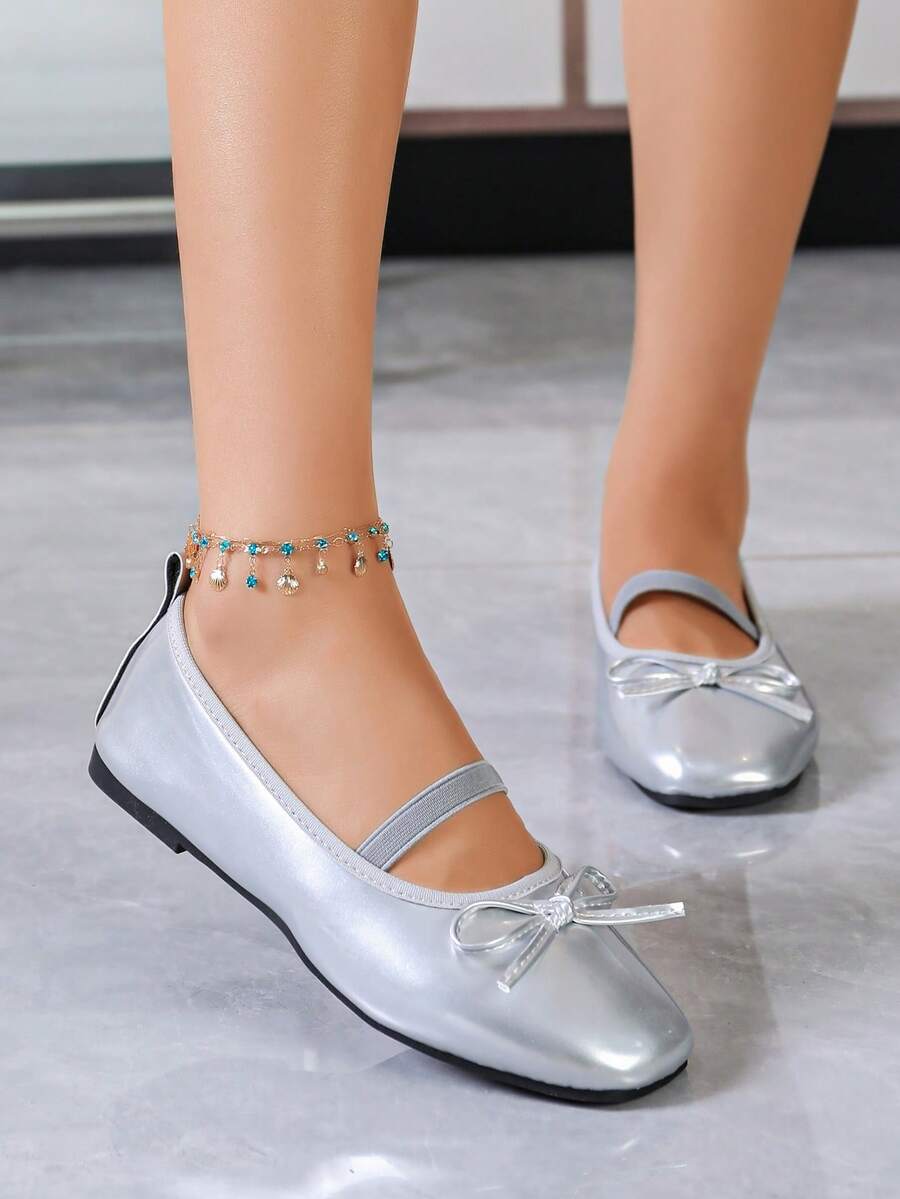 Square toe ballet flat shoes with bow detail and slip-on wide fit design.