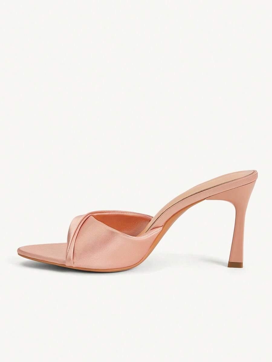 Women's peep toe high-heeled stiletto sandals with slingback strap in light metallic finish.