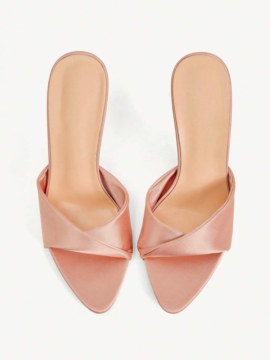 Women's peep toe high-heeled stiletto sandals with slingback strap in light metallic finish.