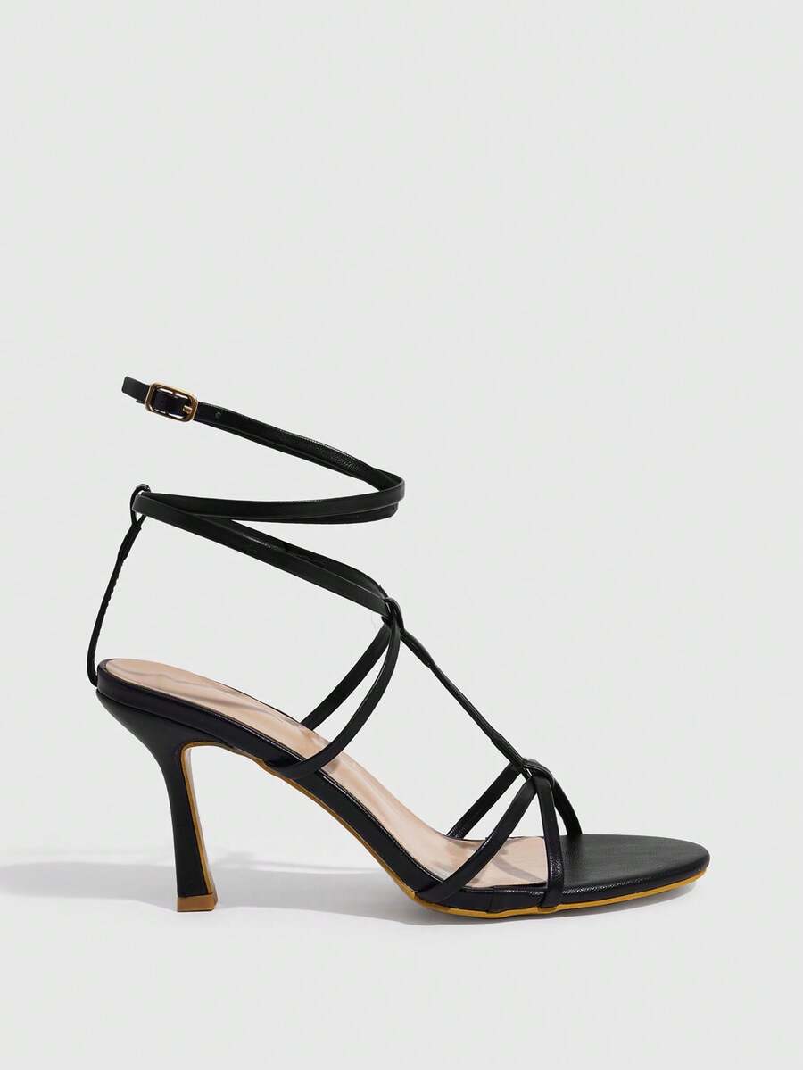 Women's open round toe high heel sandals with thin stiletto heel, hollow strap design, and ankle buckle closure.